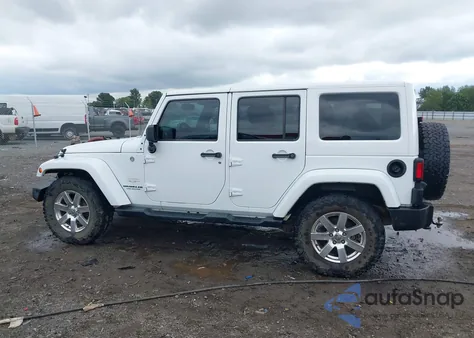 2013 Jeep Wrangler Unlimited Sahara z USA, uszkodzony, nr VIN 1C4BJWEG3DL677904